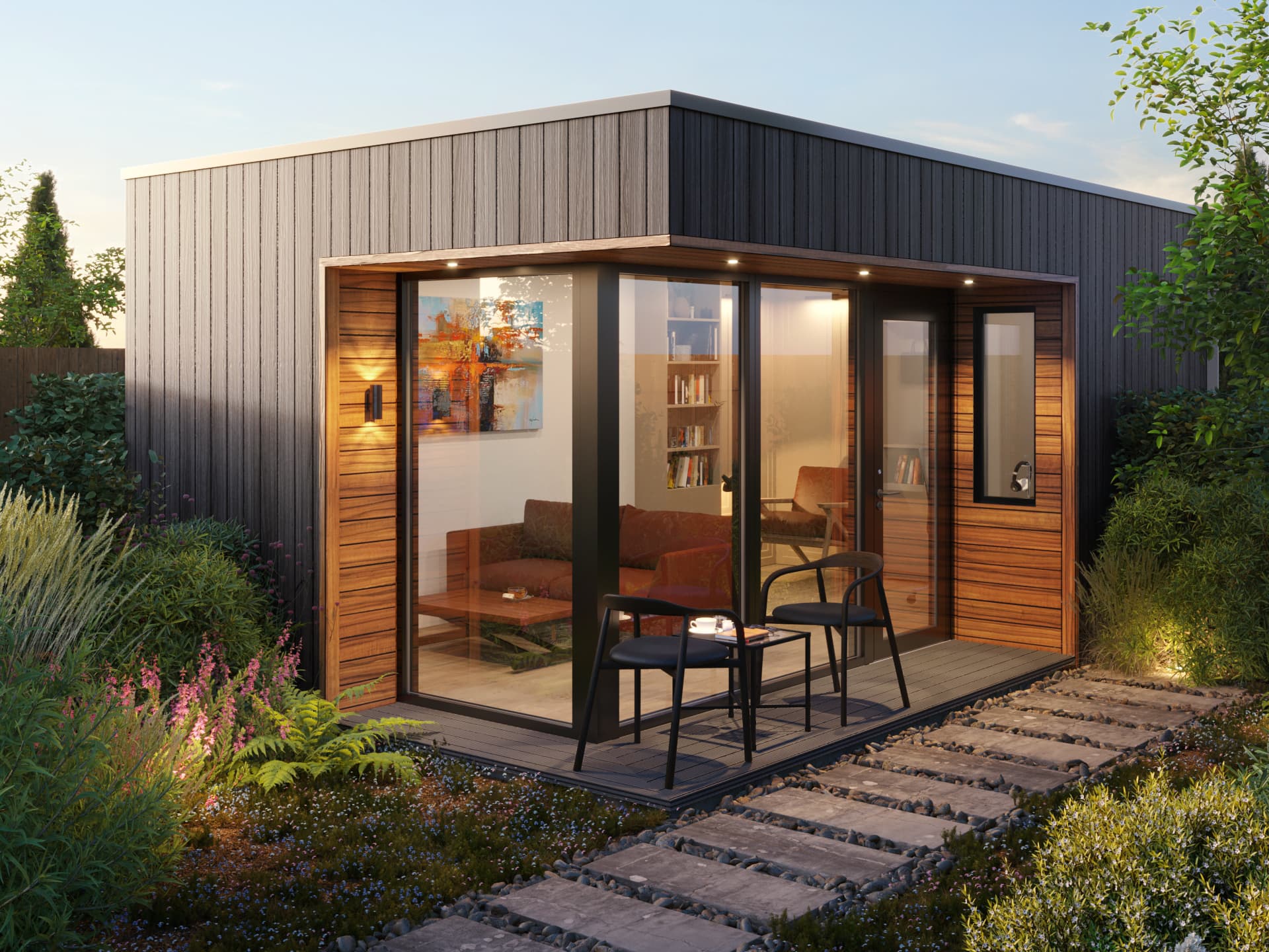 A large contemporary Shomera 23 garden studio at dusk