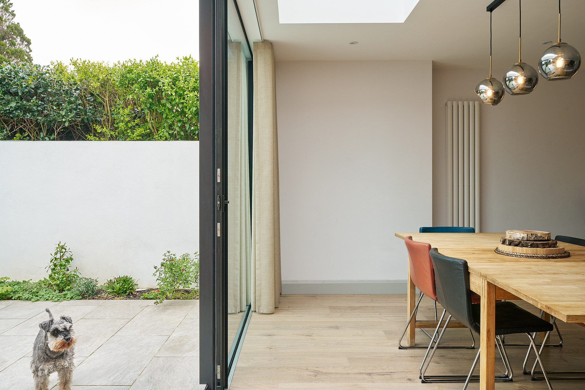 The Auburn Road extension's dining space opening to the patio